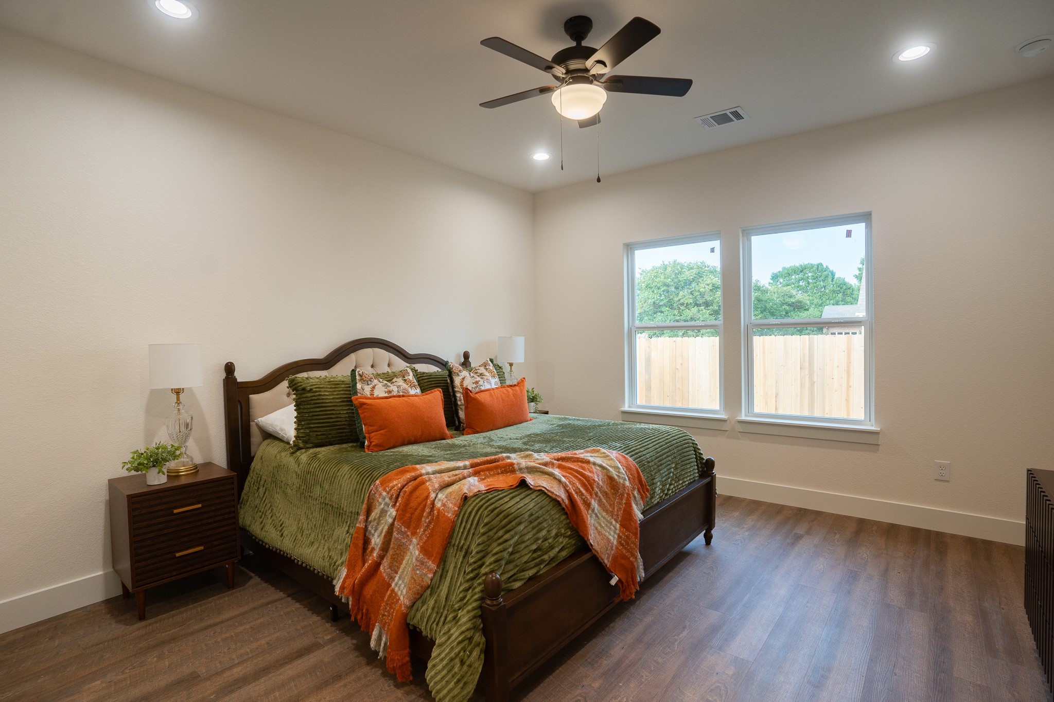 304 String Prairie Way Smithville, TX 78957 - Photo 15 of 30 Bedroom with baseboards, dark wood-style flooring, recessed lighting, and ceiling fan