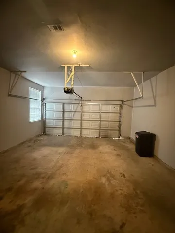 a view of a room with a window