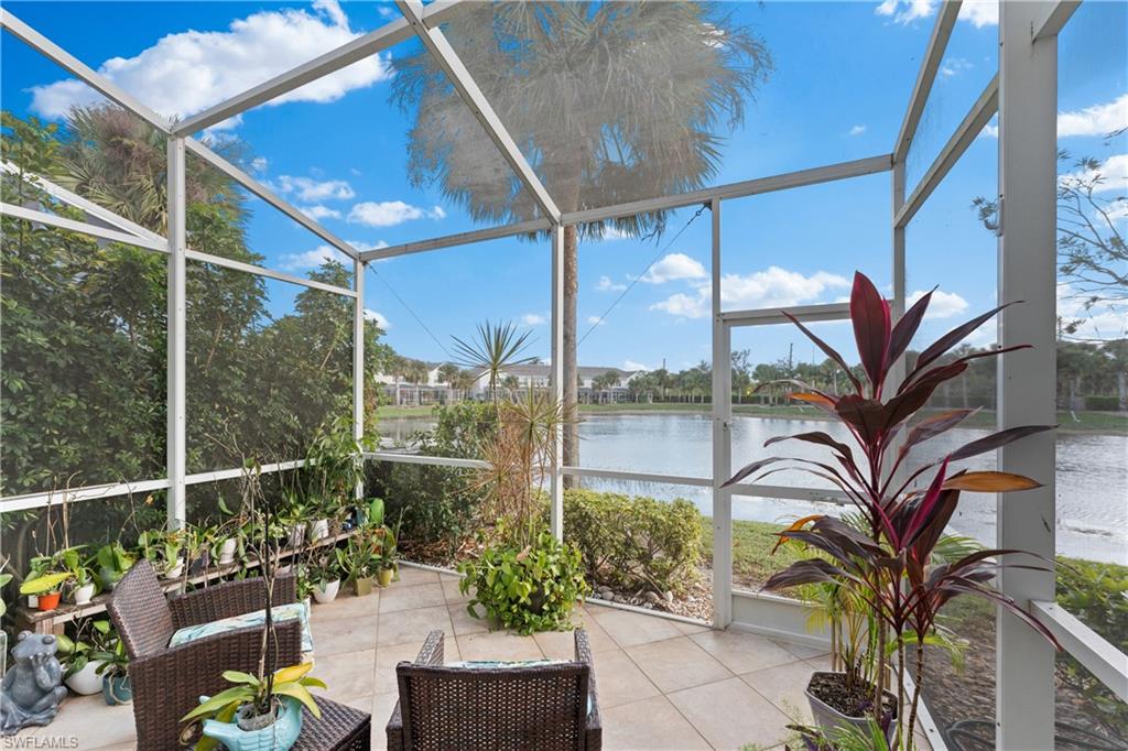 16191 Ravina Way, Unit 23 Naples, FL 34110 - Photo 26 of 29 Unfurnished sunroom with a water view