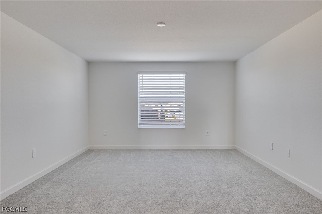 14961 Anchorage Road Punta Gorda, FL 33982 - Photo 22 of 32 an empty room with a window