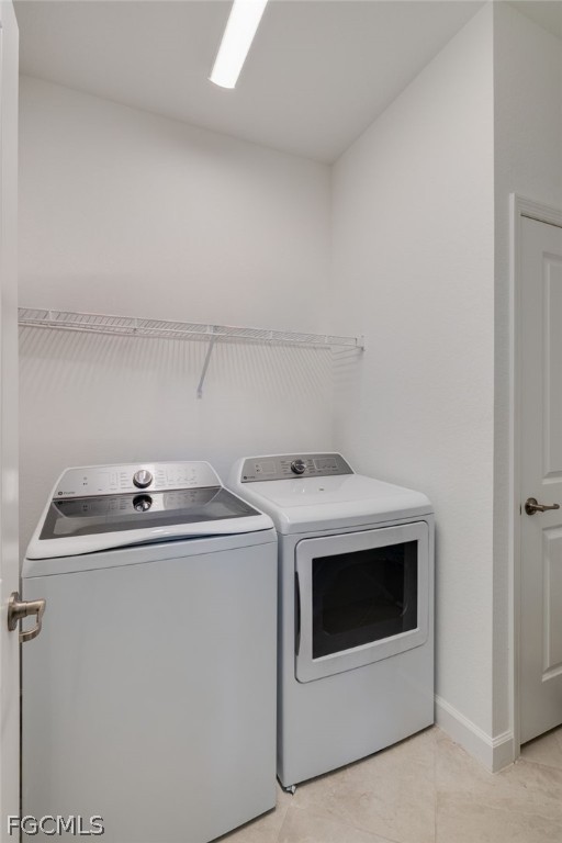 14961 Anchorage Road Punta Gorda, FL 33982 - Photo 30 of 32 a utility room with dryer and washer