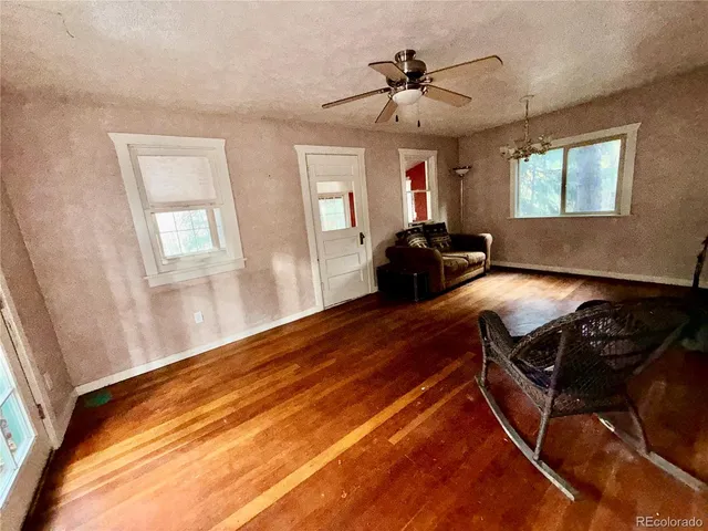 a bed room with a bed and a window