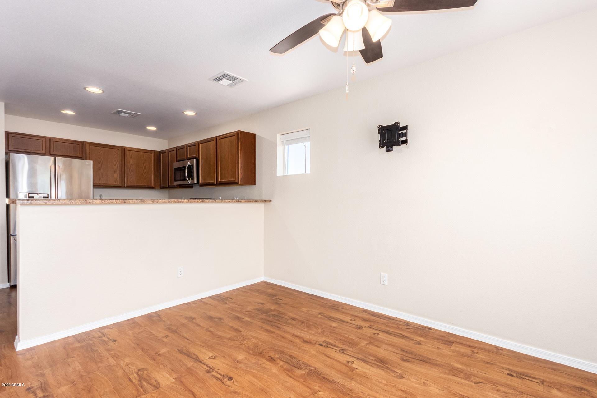 2729 East Phelps Road Phoenix, AZ 85032 - Photo 7 of 22 Family Room open to kitchen