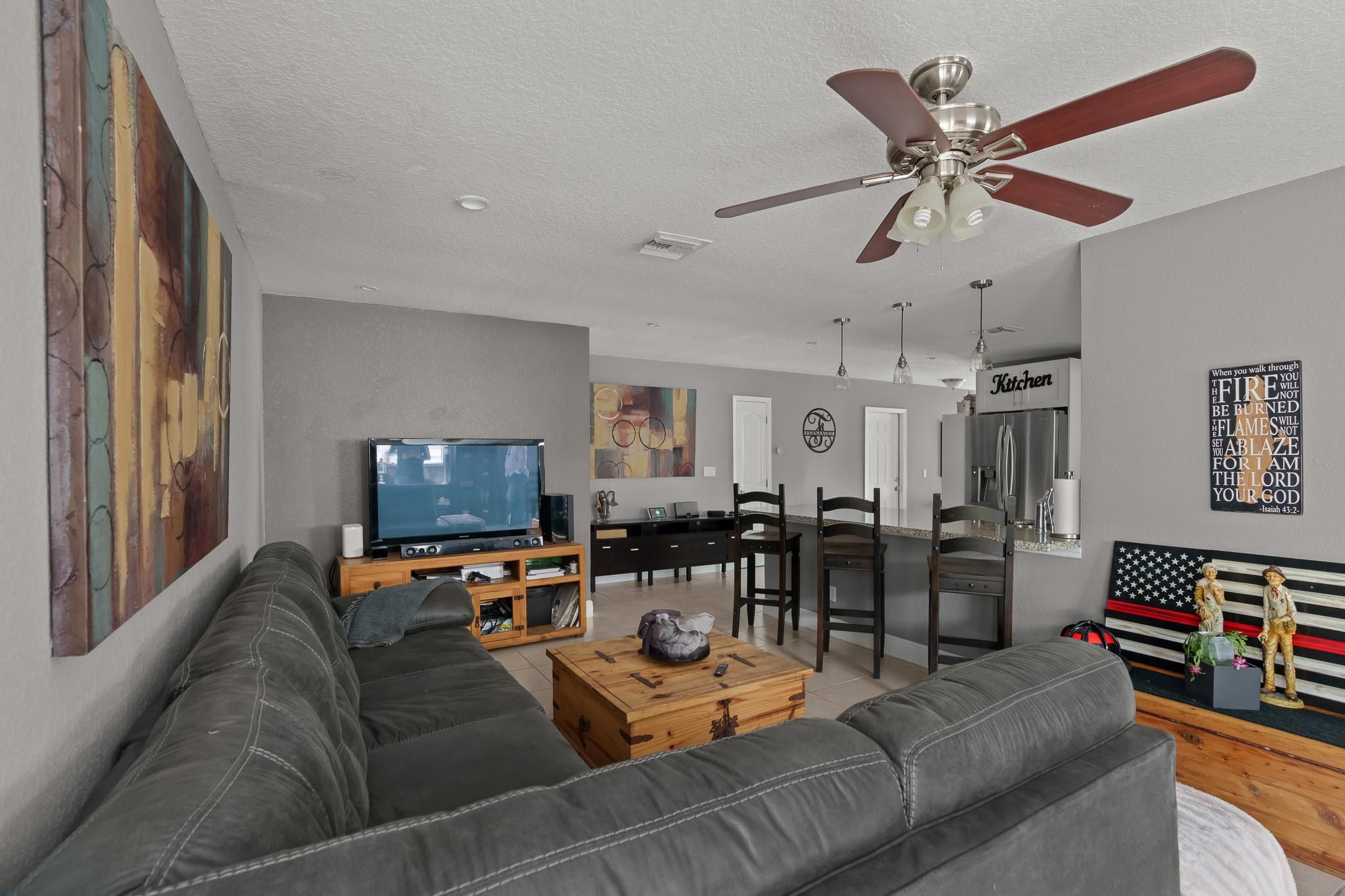 9402 Northwest 70th Street Tamarac, FL 33321 - Photo 22 of 60 a living room with furniture and wooden floor