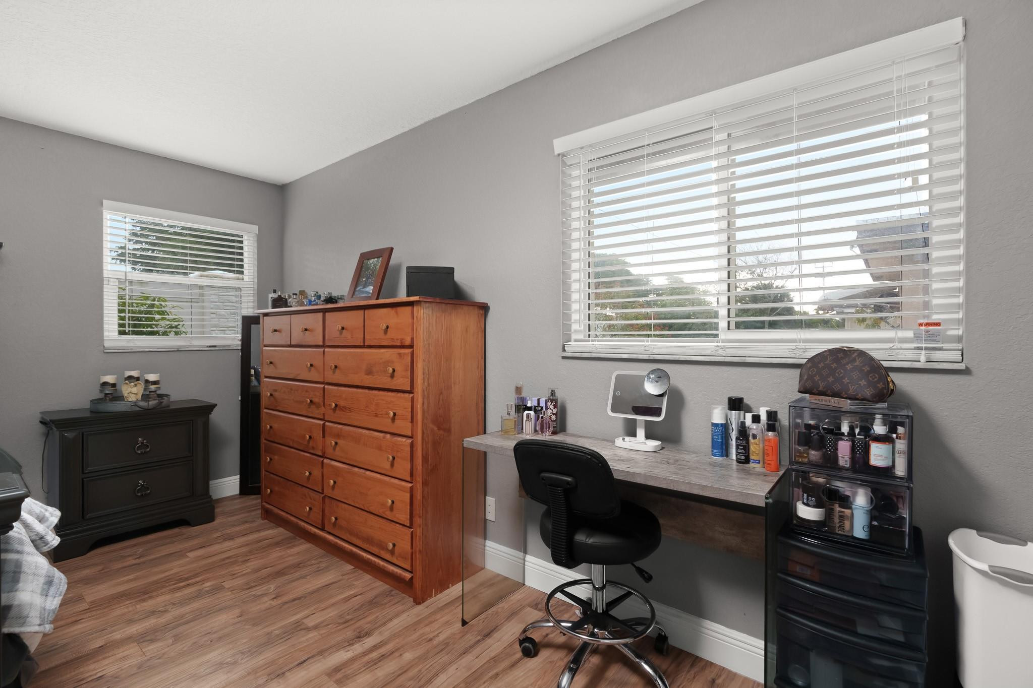9402 Northwest 70th Street Tamarac, FL 33321 - Photo 37 of 60 a view of a workspace with furniture and a window