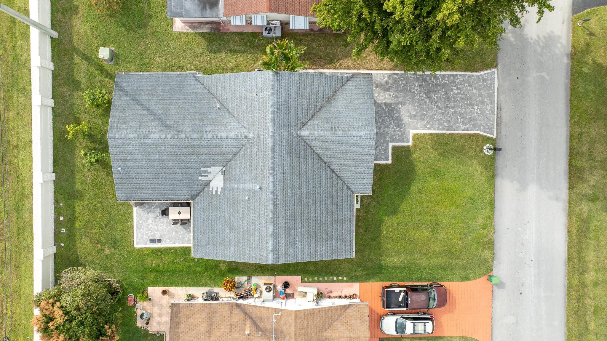 9402 Northwest 70th Street Tamarac, FL 33321 - Photo 54 of 60 an aerial view of a house with a yard
