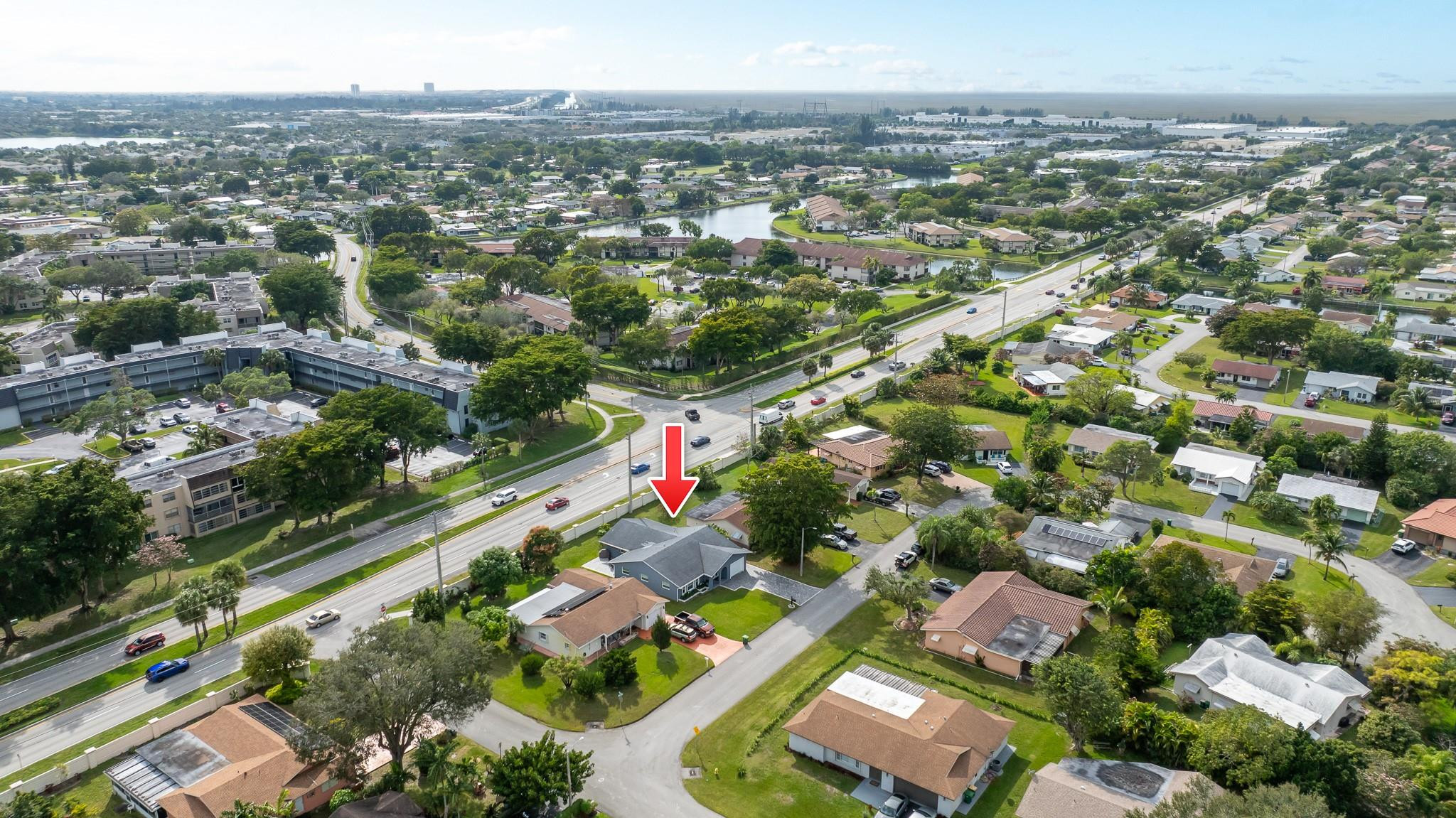 9402 Northwest 70th Street Tamarac, FL 33321 - Photo 57 of 60 an aerial view of residential houses with outdoor space and trees