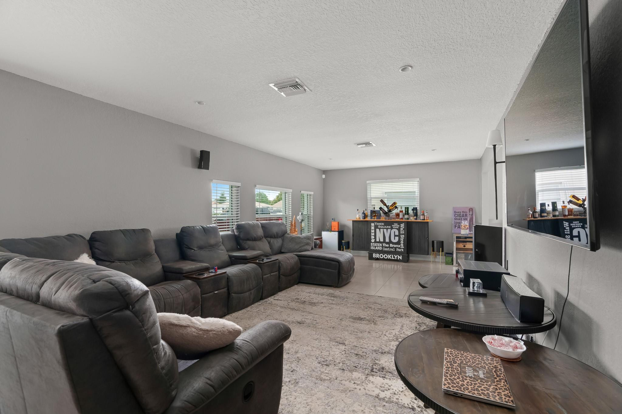9402 Northwest 70th Street Tamarac, FL 33321 - Photo 7 of 60 a living room with furniture and a wooden floor