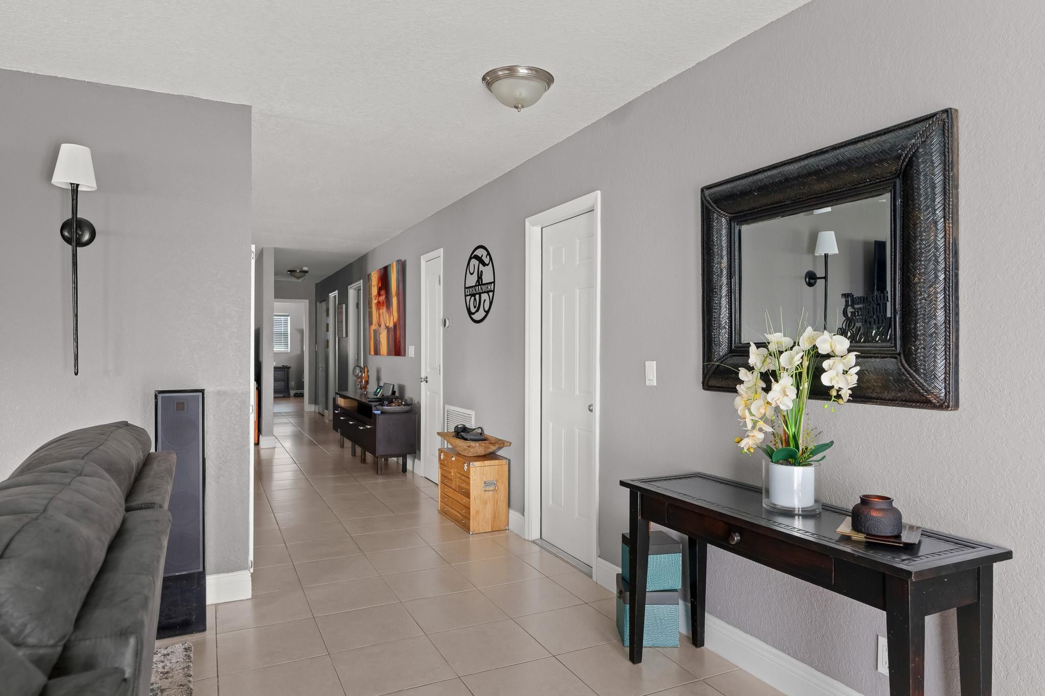 9402 Northwest 70th Street Tamarac, FL 33321 - Photo 10 of 60 a living room with furniture