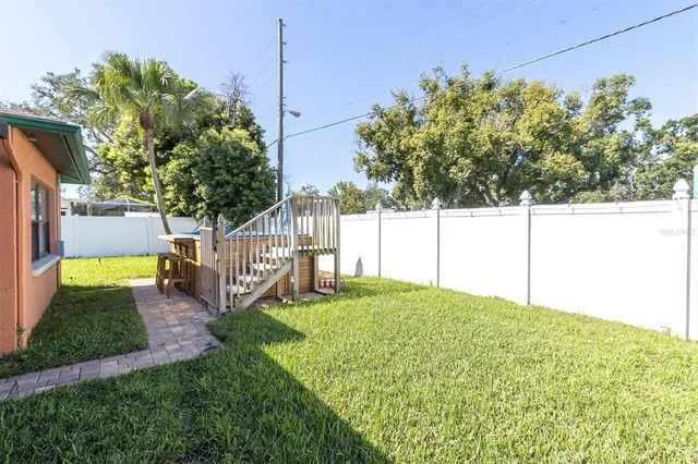 a view of a backyard with garden