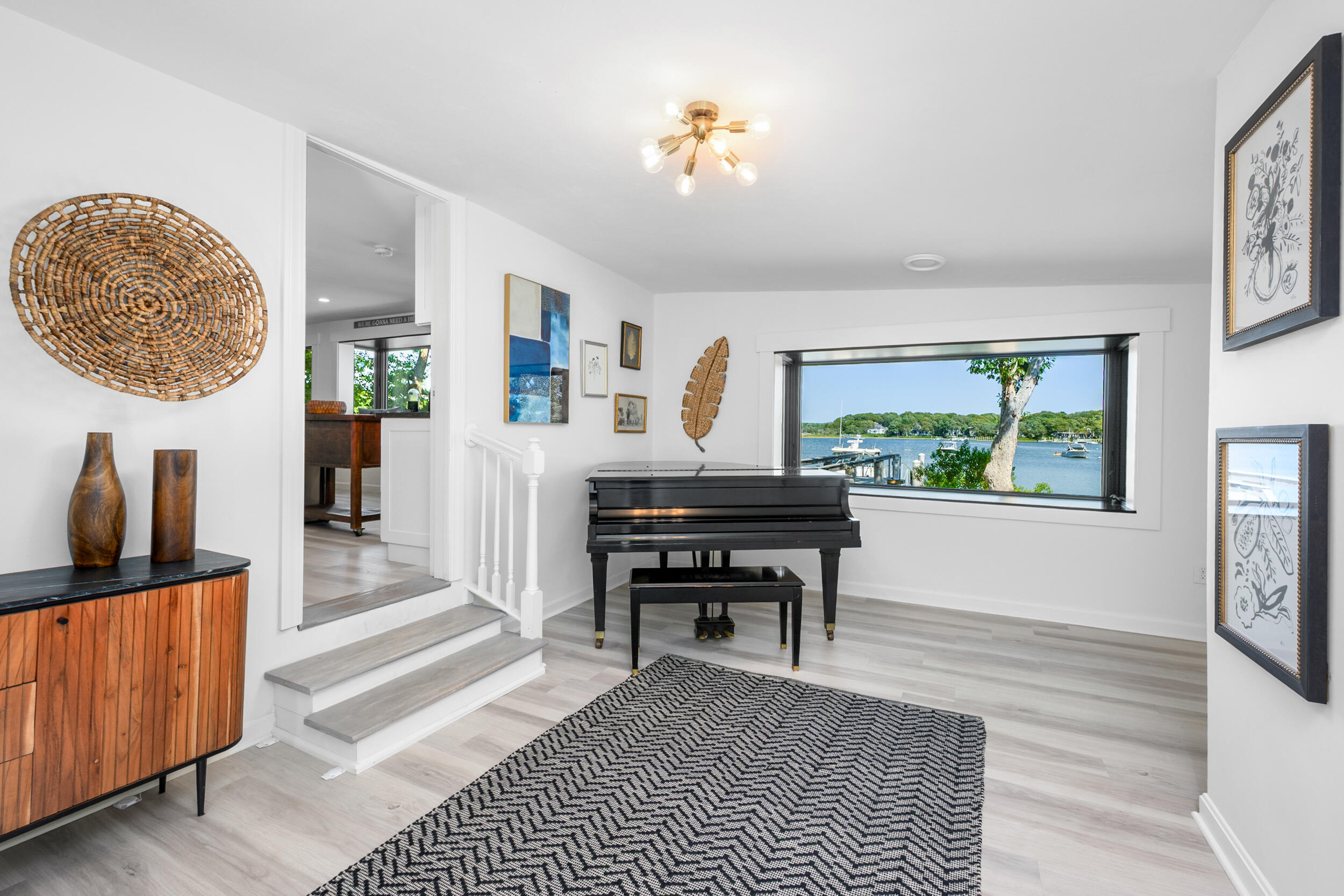 18 Great River Road Mashpee, MA 02649 - Photo 12 of 99 a living room with furniture and a lamp