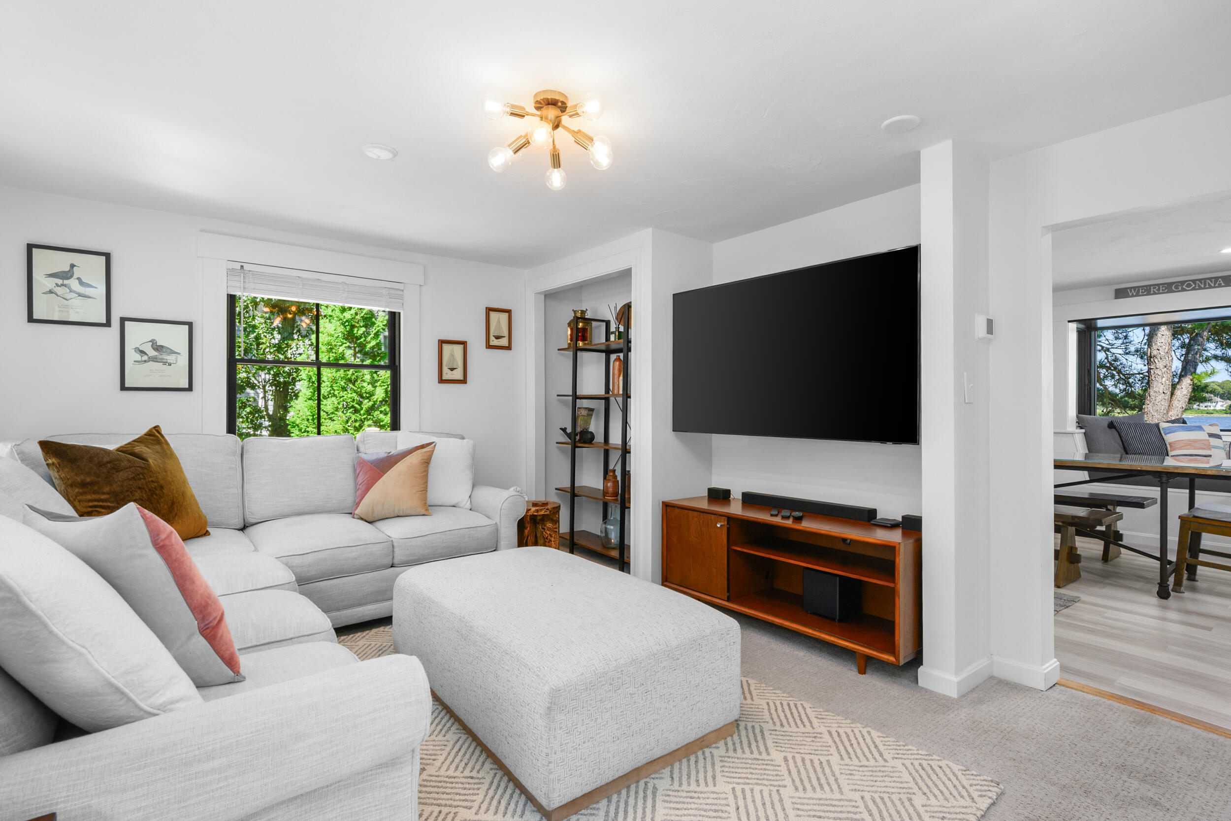 18 Great River Road Mashpee, MA 02649 - Photo 26 of 99 a living room with furniture and a flat screen tv