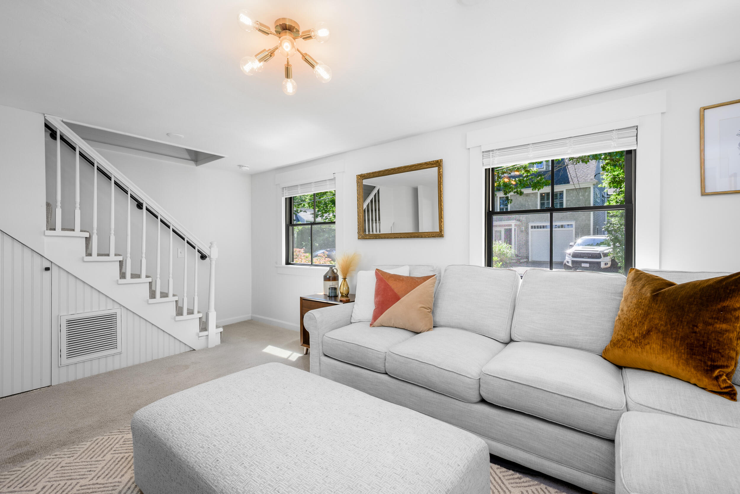 18 Great River Road Mashpee, MA 02649 - Photo 27 of 99 a living room with furniture and a large window