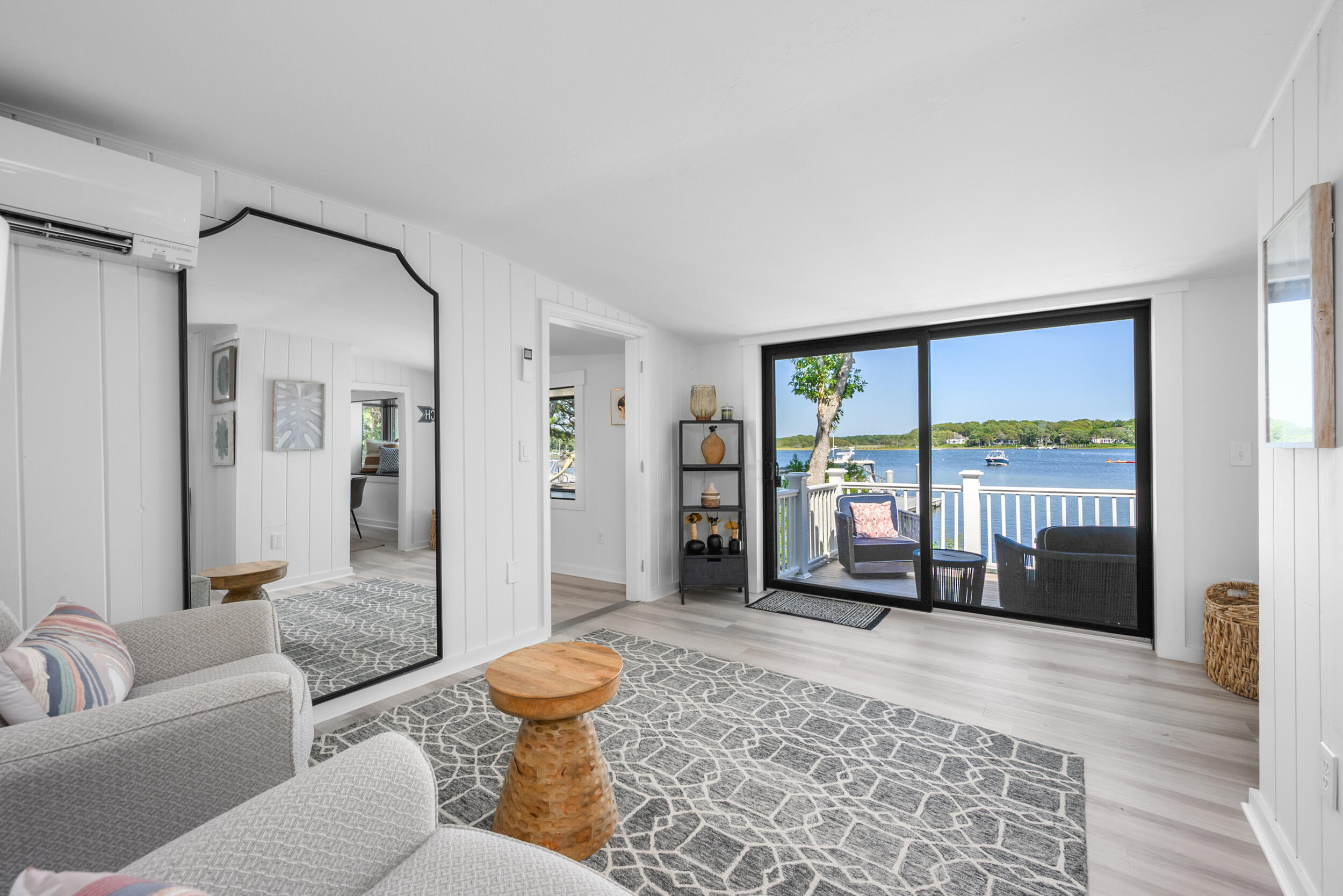 18 Great River Road Mashpee, MA 02649 - Photo 31 of 99 a living room with furniture and a large window