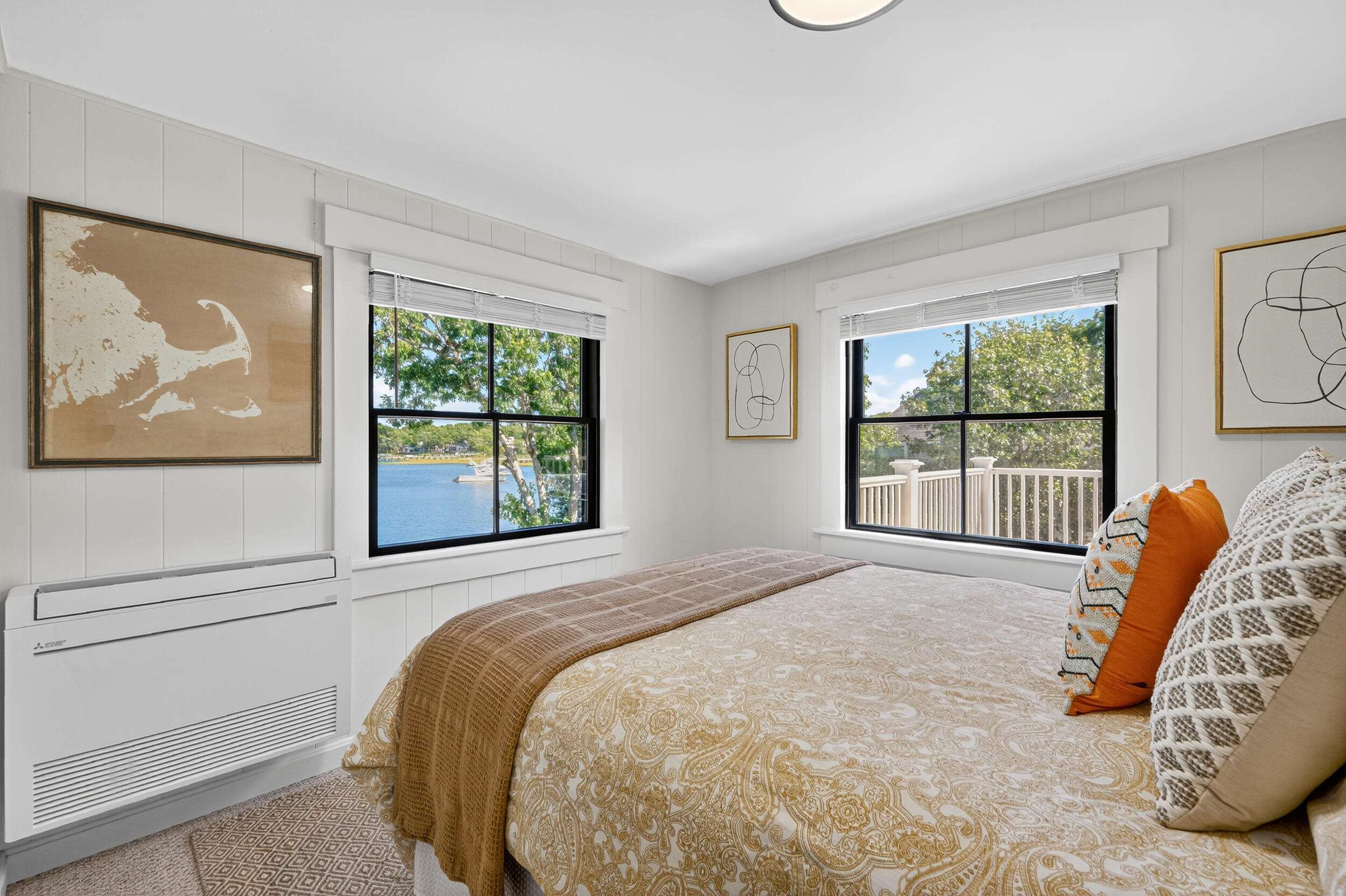 18 Great River Road Mashpee, MA 02649 - Photo 47 of 99 a bedroom with a bed and a large window