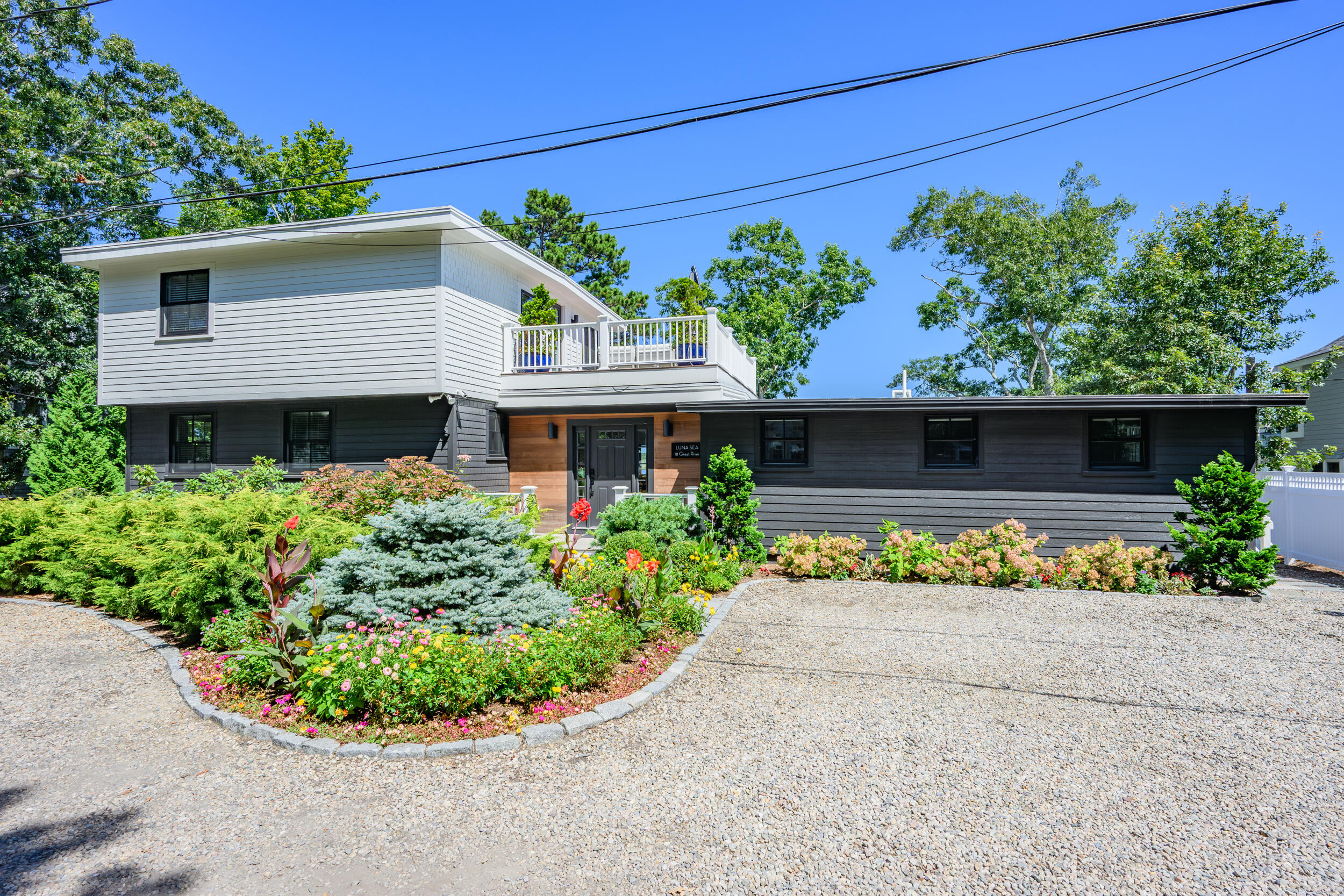 18 Great River Road Mashpee, MA 02649 - Photo 52 of 99 front view of a house with a small yard