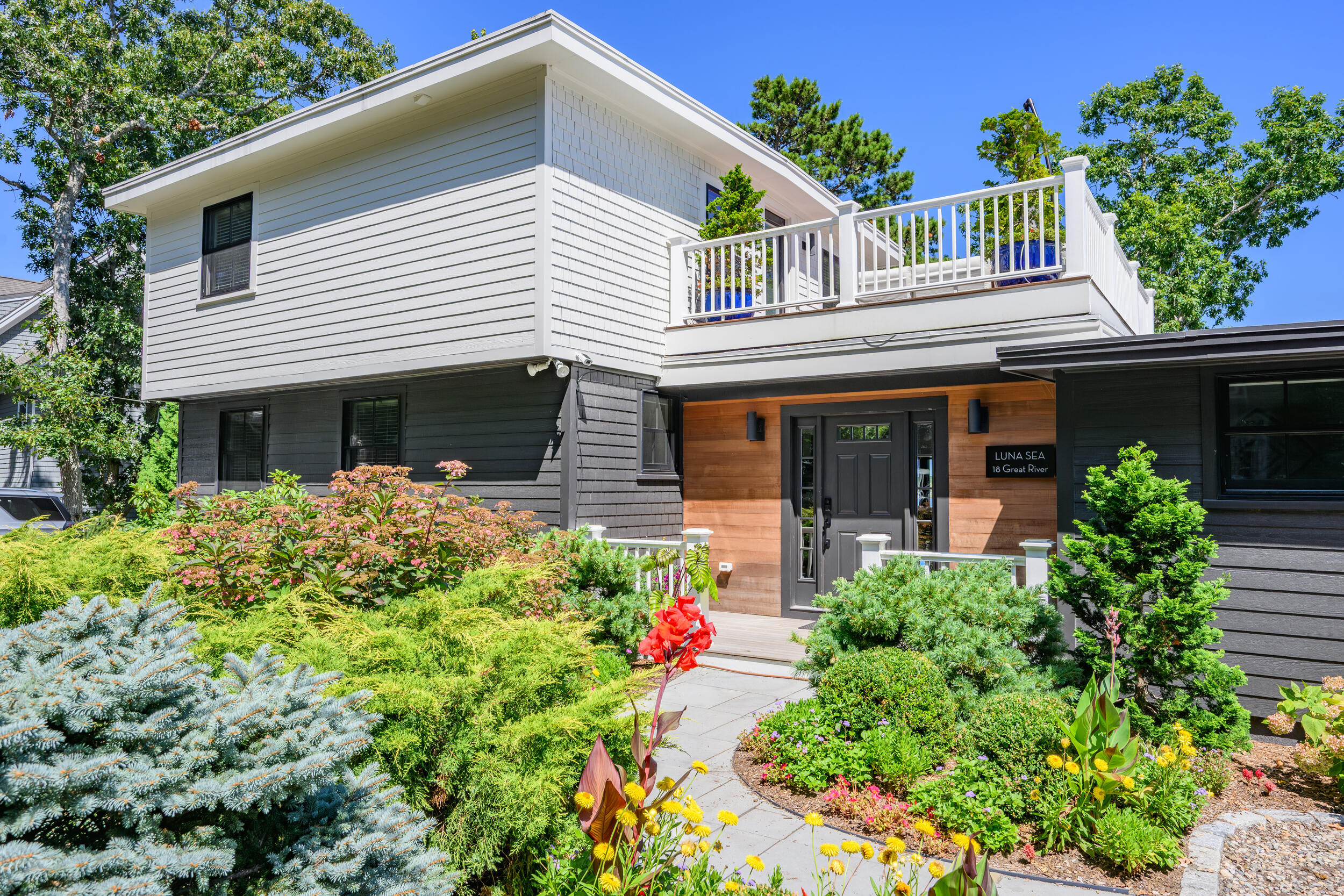 18 Great River Road Mashpee, MA 02649 - Photo 54 of 99 front view of a house with a yard