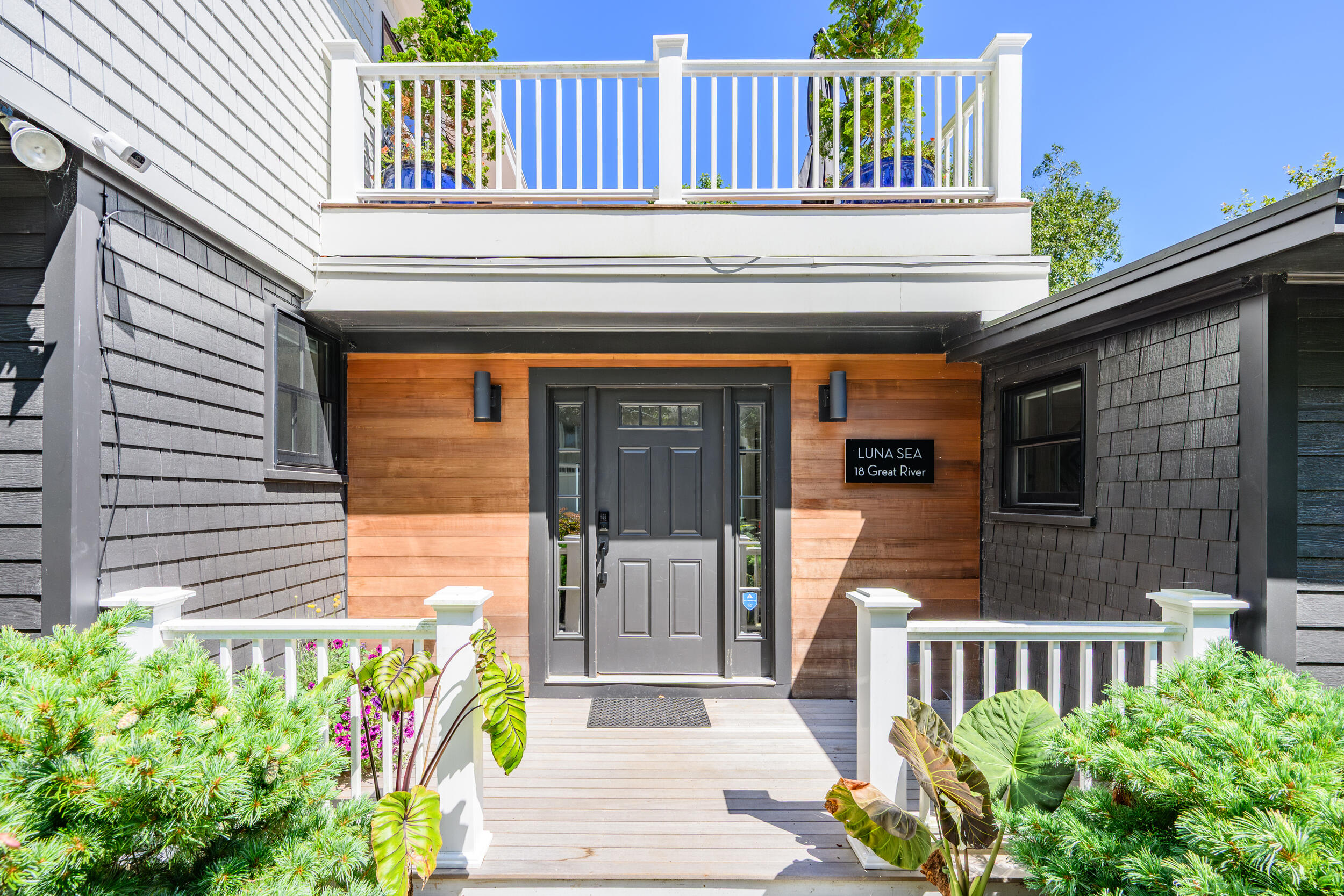 18 Great River Road Mashpee, MA 02649 - Photo 57 of 99 a front view of a house with a garden