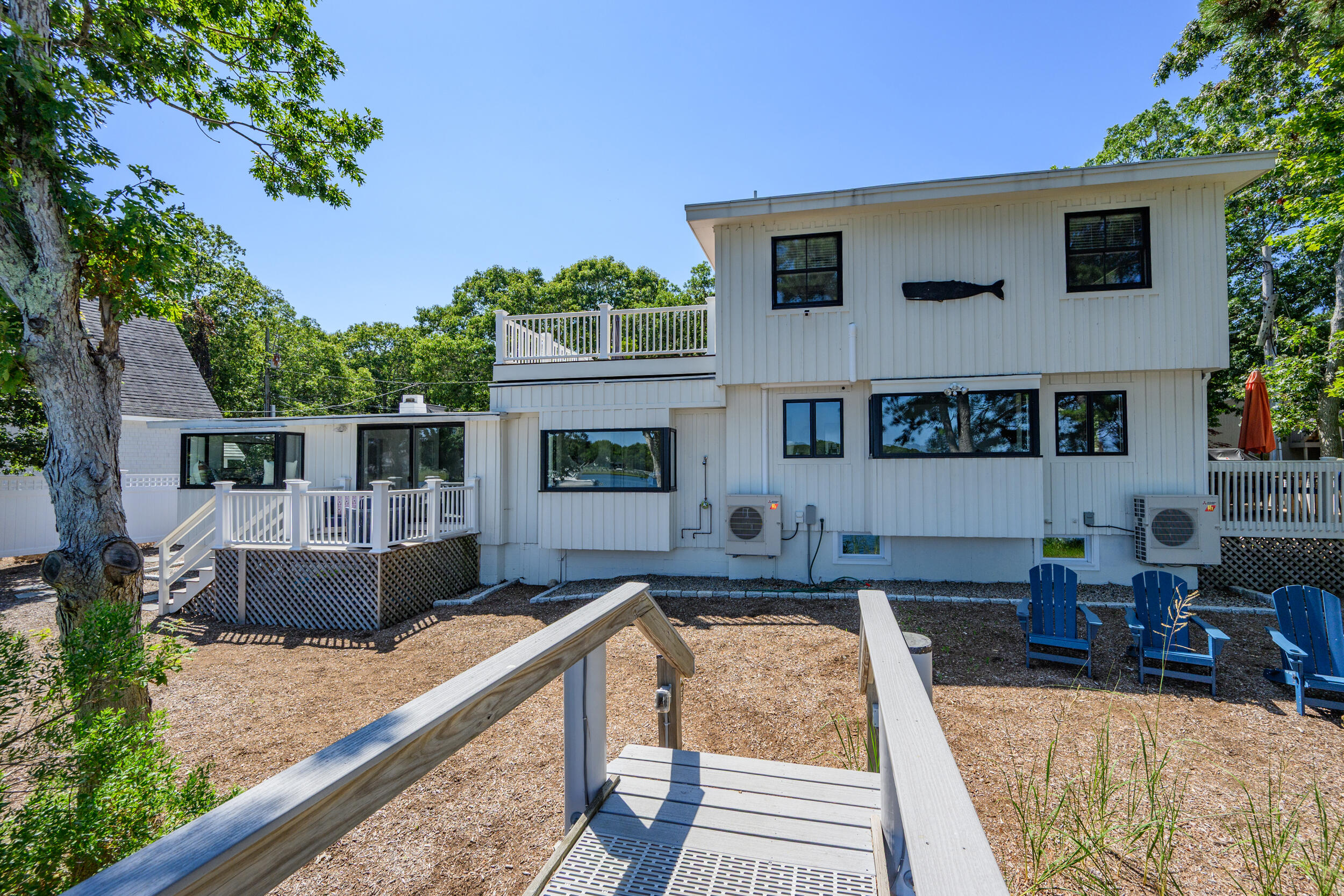 18 Great River Road Mashpee, MA 02649 - Photo 72 of 99 a view of a house with backyard and sitting area