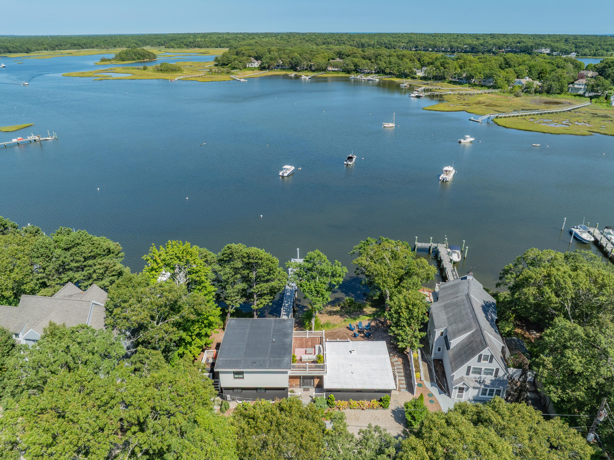 18 Great River Road Mashpee, MA 02649 - Photo 87 of 99 an aerial view of a house with a yard and lake view