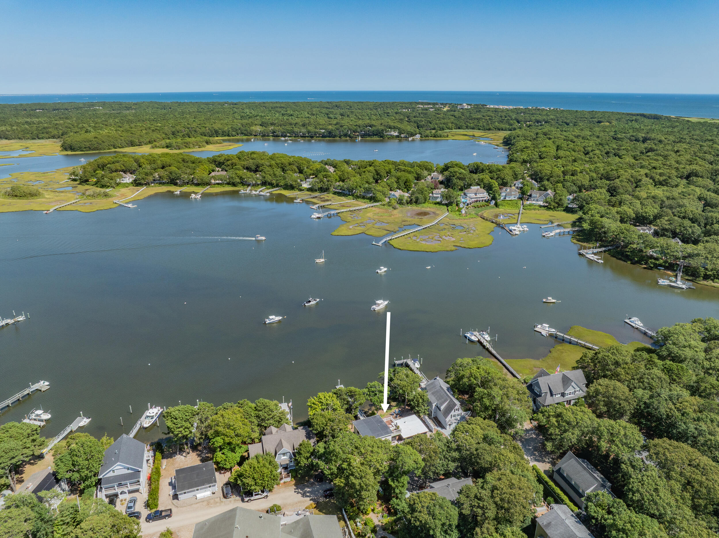 18 Great River Road Mashpee, MA 02649 - Photo 89 of 99 an aerial view of ocean and residential houses with outdoor space