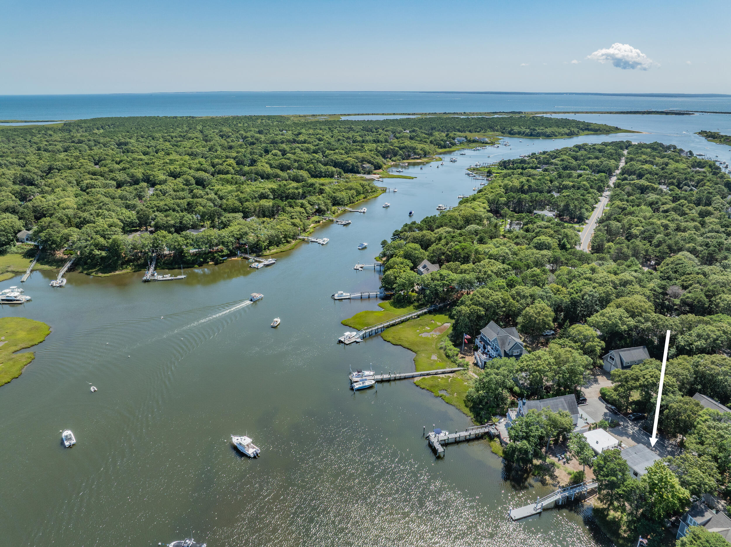 18 Great River Road Mashpee, MA 02649 - Photo 93 of 99 an aerial view of a house with a yard and lake view