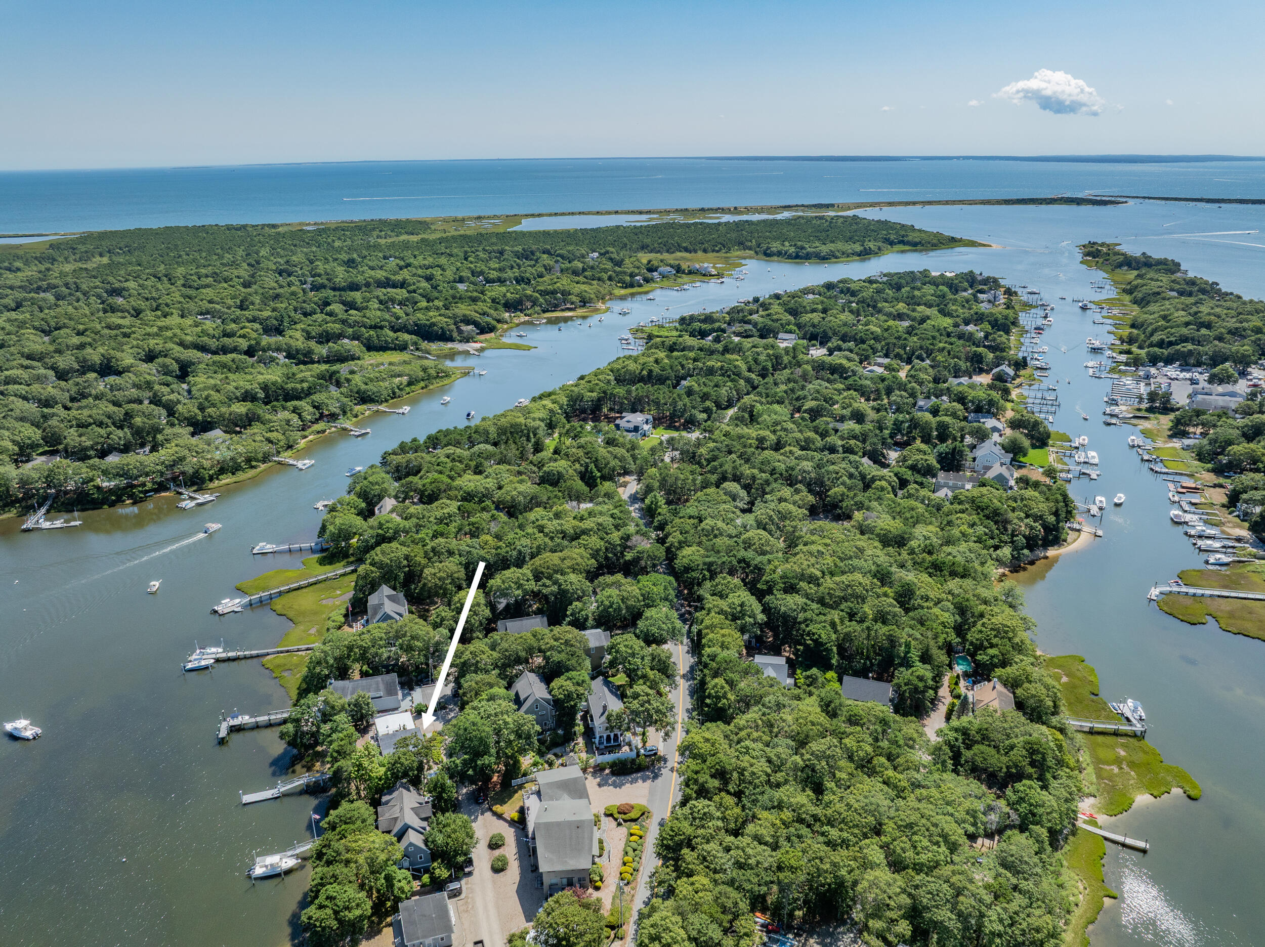 18 Great River Road Mashpee, MA 02649 - Photo 94 of 99 an aerial view of a houses with a yard and lake view