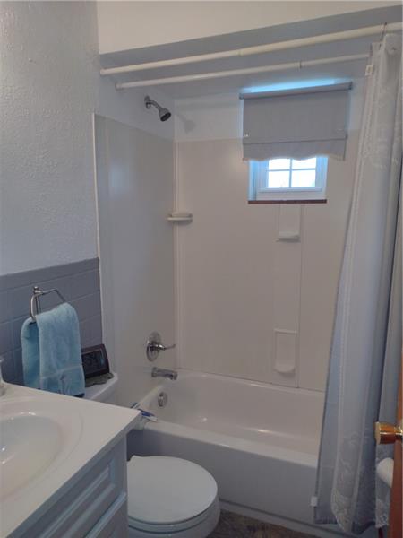 118 Sylvan Drive Lower Burrell, PA 15068 - Photo 8 of 14 a bathroom with a toilet and a bathtub