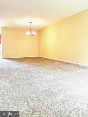 a view of a room with an empty space