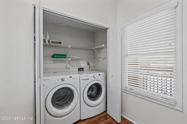 a utility room with dryer and washer