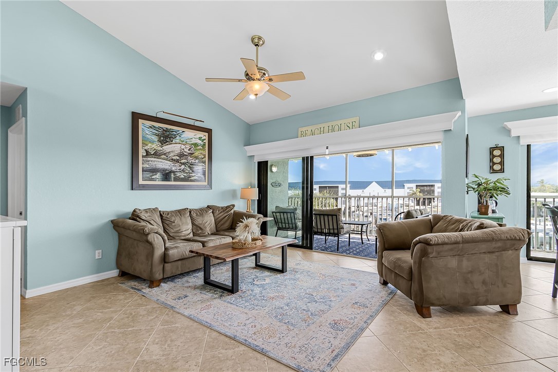 16641 Stringfellow Road, Unit 506 Bokeelia, FL 33922 - Photo 3 of 43 a living room with furniture and a large window