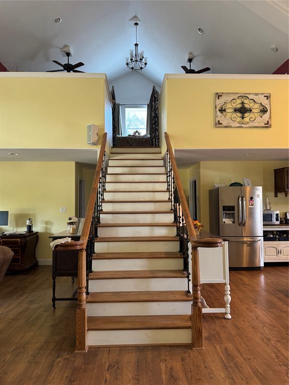 1794 Cr 527 Road Baird, TX 79504 - Photo 24 of 38 Grand staircase featuring wood treads and wrought iron balusters