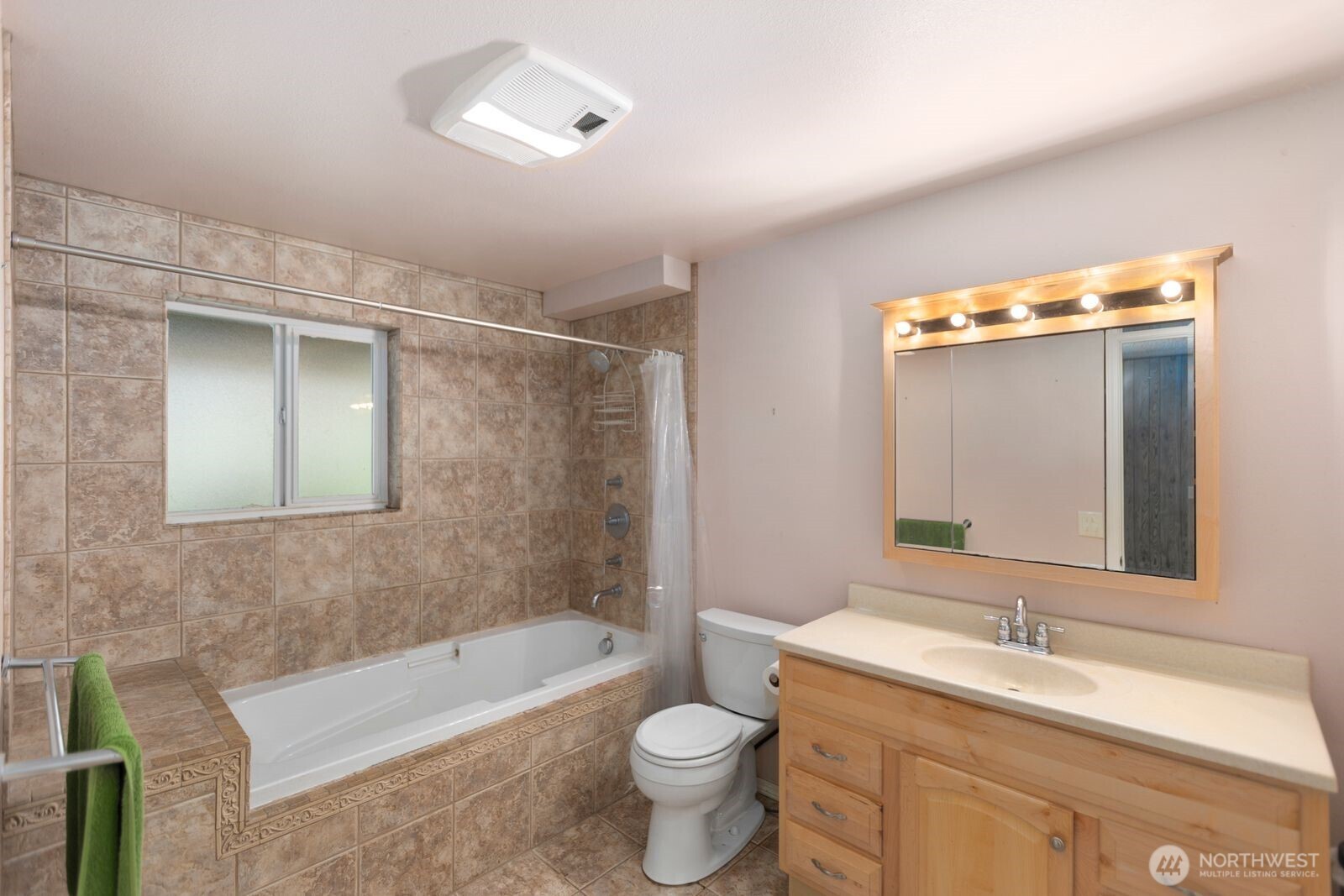 21627 9th Place West Bothell, WA 98021 - Photo 32 of 40 a bathroom with a sink a toilet and bathtub
