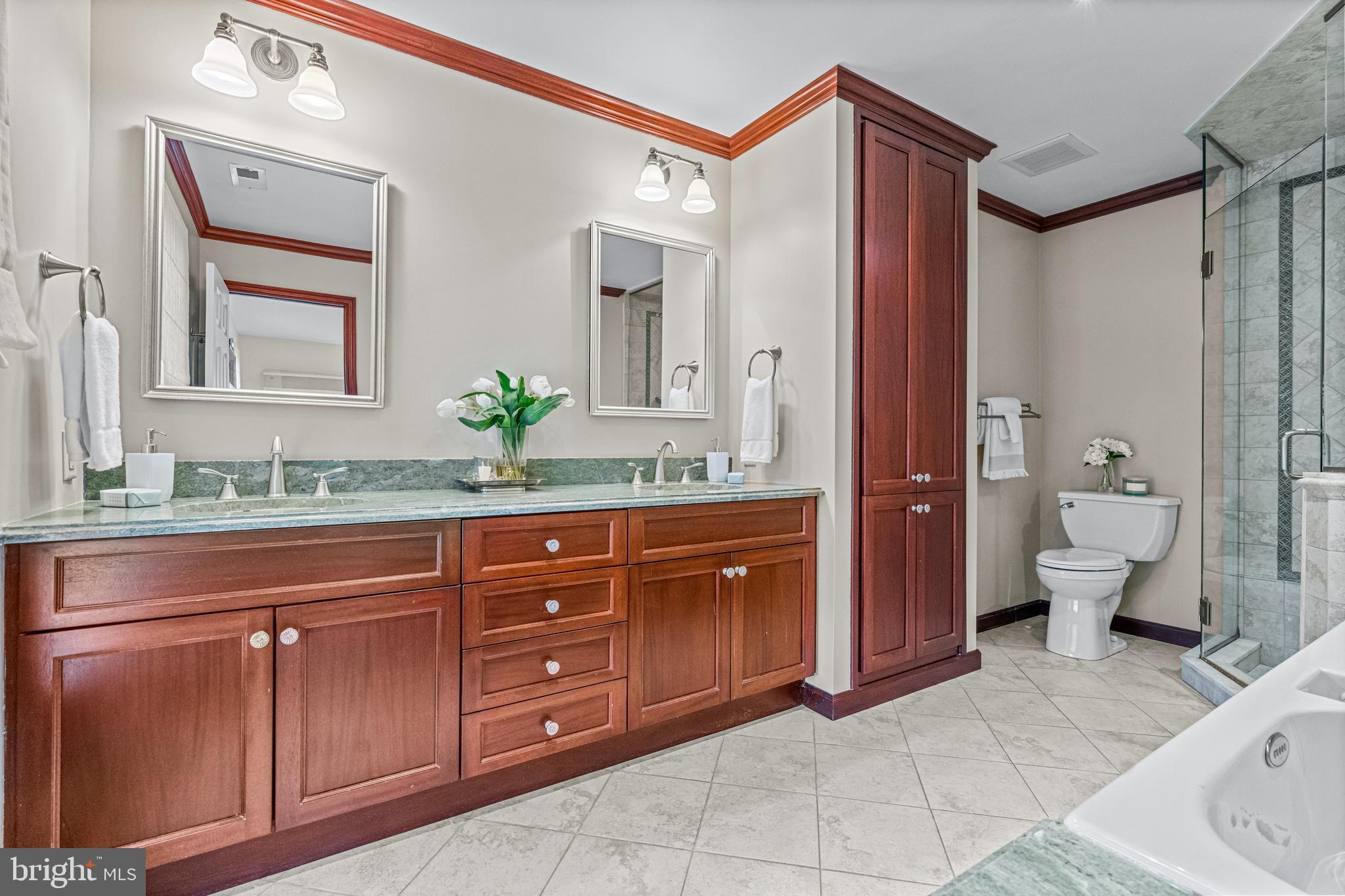 607 Foxfields Road Bryn Mawr, PA 19010 - Photo 26 of 48 Primary bath with custom cabinetry and granite
