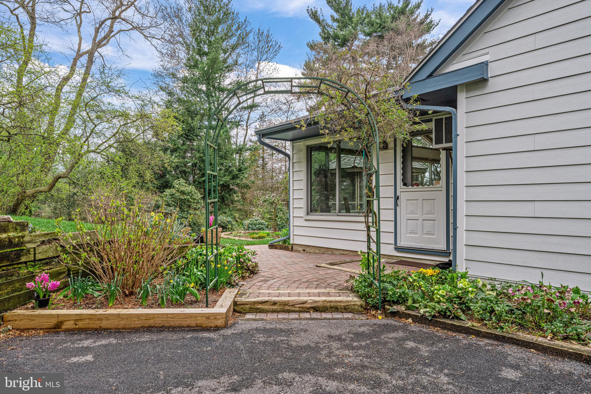 607 Foxfields Road Bryn Mawr, PA 19010 - Photo 41 of 48 Driveway access to sun porch and back yard