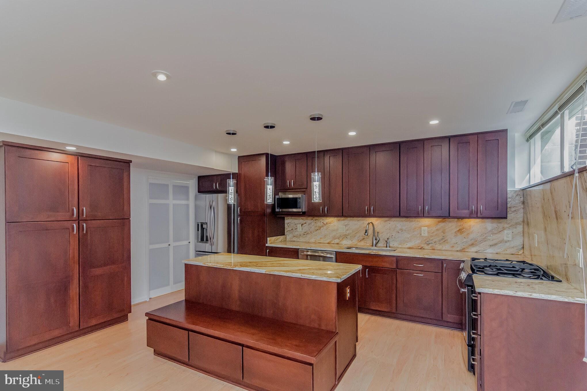 11503 Maple Ridge Road Reston, VA 20190 - Photo 11 of 94 Large kitchen with island and pantry