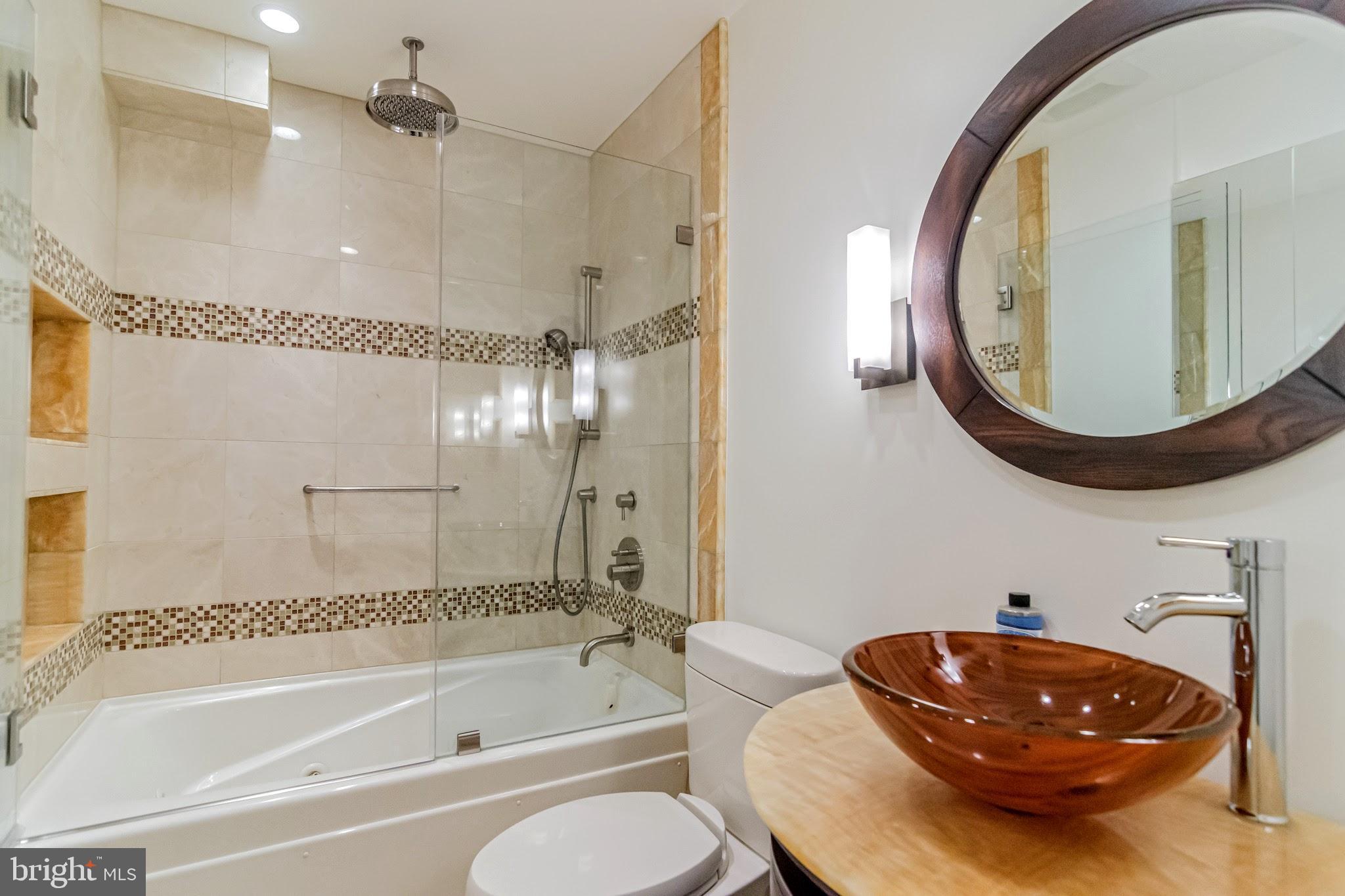 11503 Maple Ridge Road Reston, VA 20190 - Photo 8 of 94 Upstairs marble & onyx Bath with jacuzzi tub,