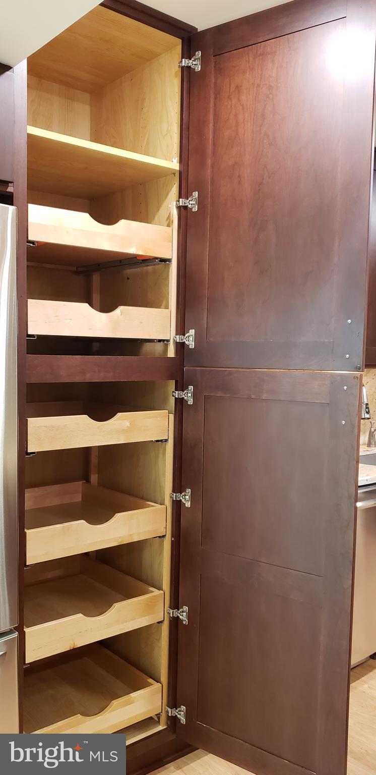 11503 Maple Ridge Road Reston, VA 20190 - Photo 77 of 94 Eight Ft kitchen cabinet with pullout drawers
