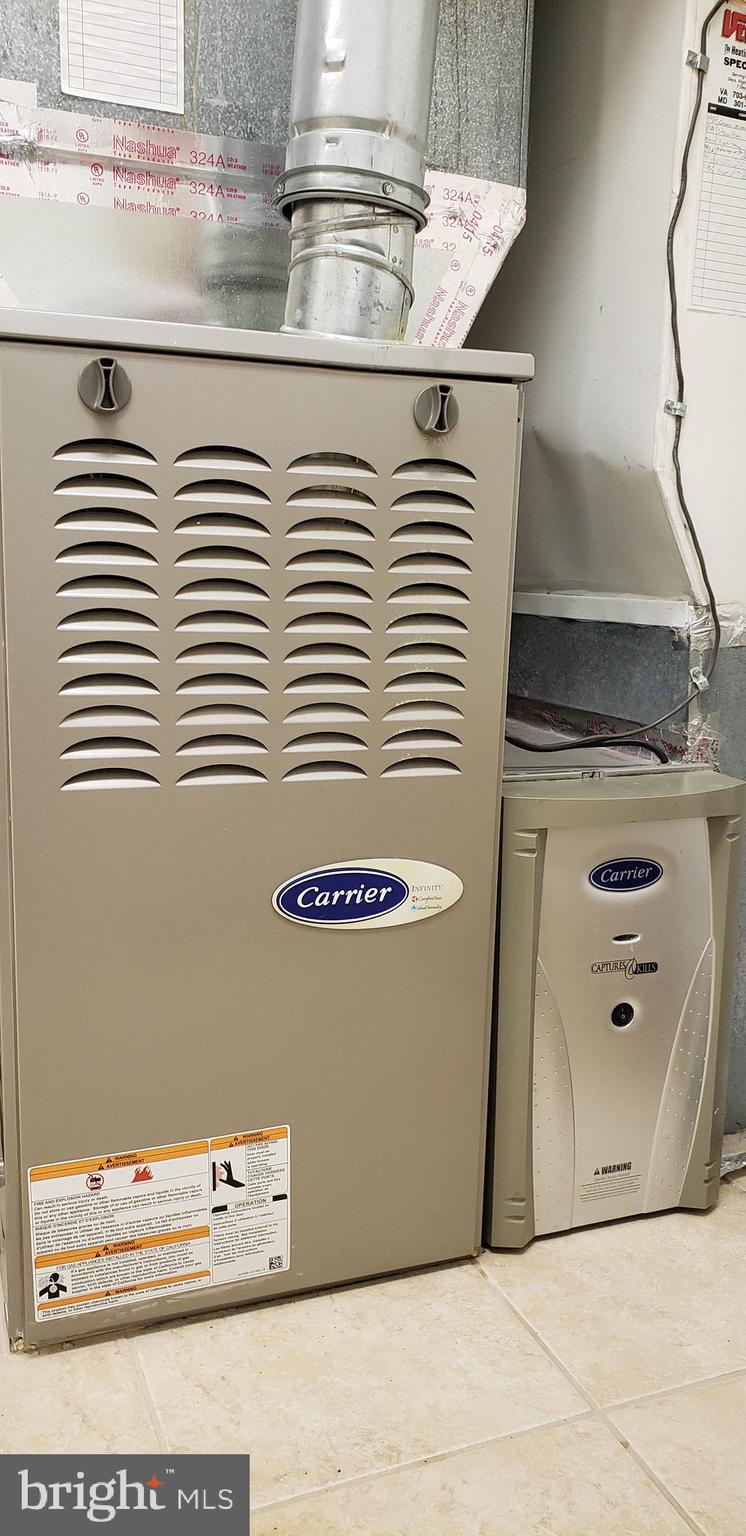 11503 Maple Ridge Road Reston, VA 20190 - Photo 89 of 94 Carrier furnace with electrostatic HEPA filter