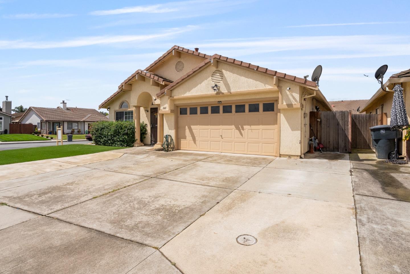 1001 Eagle Drive Salinas, CA 93905 - Photo 5 of 39 a view of a white house with a street