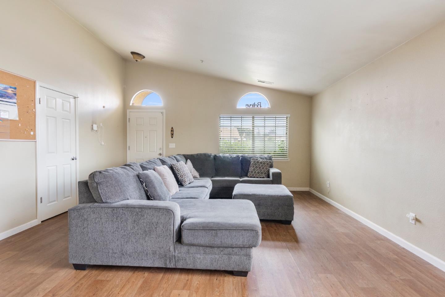 1001 Eagle Drive Salinas, CA 93905 - Photo 8 of 39 a living room with furniture and a large window