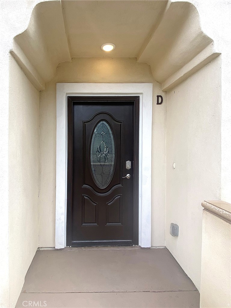 300 East Alhambra Road, Unit D Alhambra, CA 91801 - Photo 3 of 26 a front view of a house with entryway