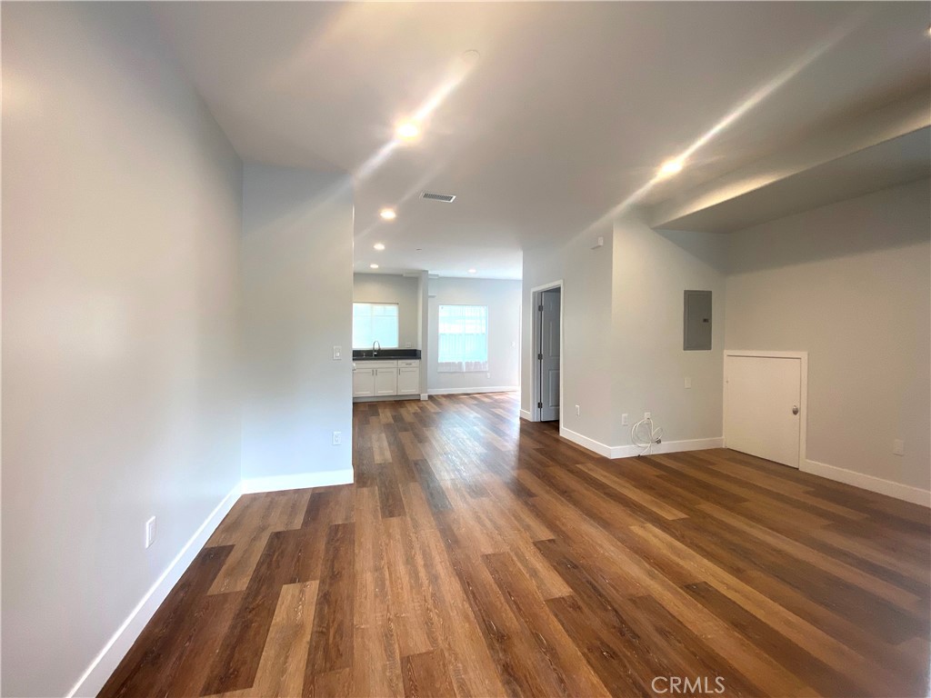 300 East Alhambra Road, Unit D Alhambra, CA 91801 - Photo 5 of 26 a view of empty room with wooden floor