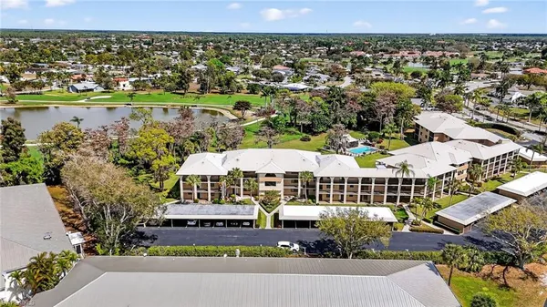 an aerial view of a house with a garden