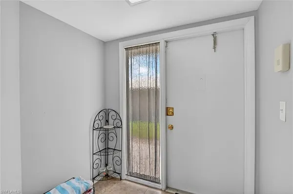 a picture of a room with rack on the wall