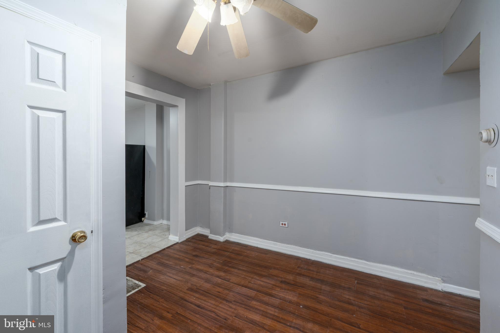 430 South Payson Street Baltimore, MD 21223 - Photo 11 of 29 wooden floor in an empty room