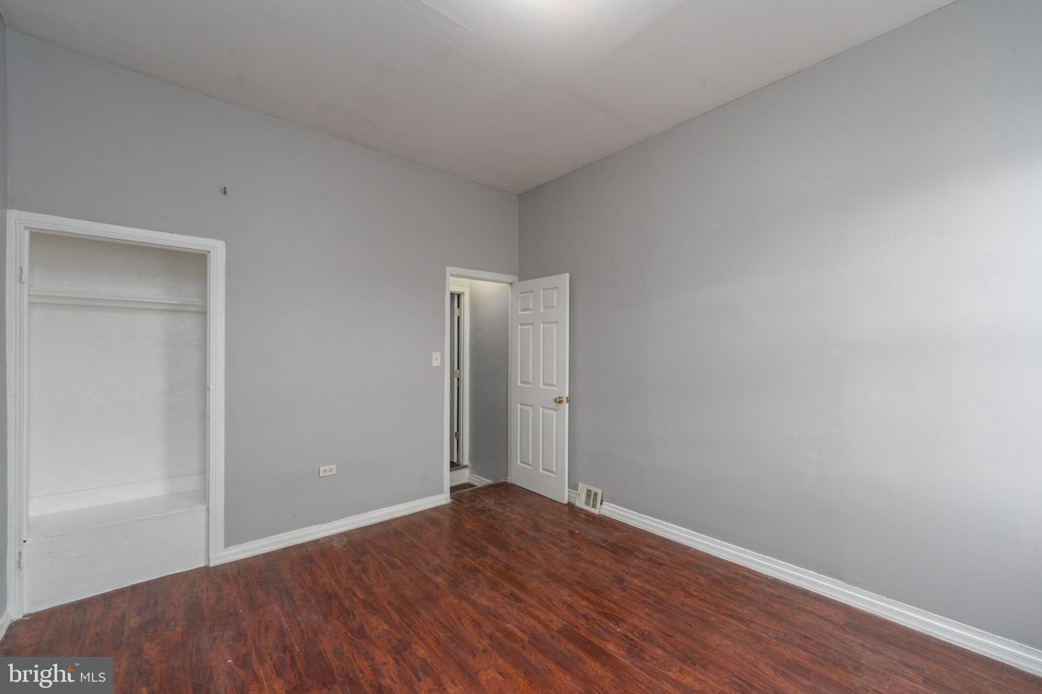 430 South Payson Street Baltimore, MD 21223 - Photo 16 of 29 a view of an empty room with wooden floor