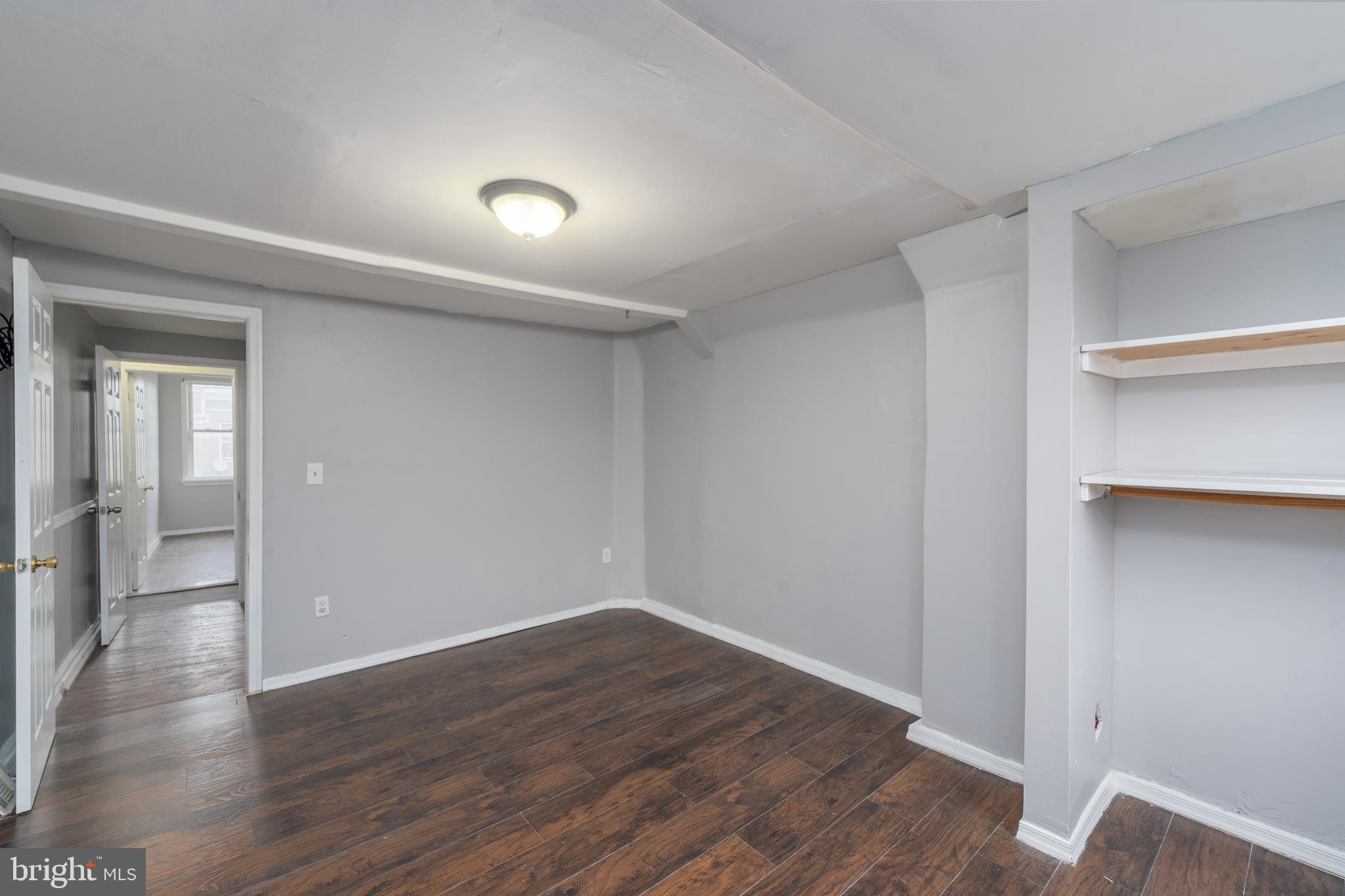 430 South Payson Street Baltimore, MD 21223 - Photo 22 of 29 a view of an empty room with wooden floor