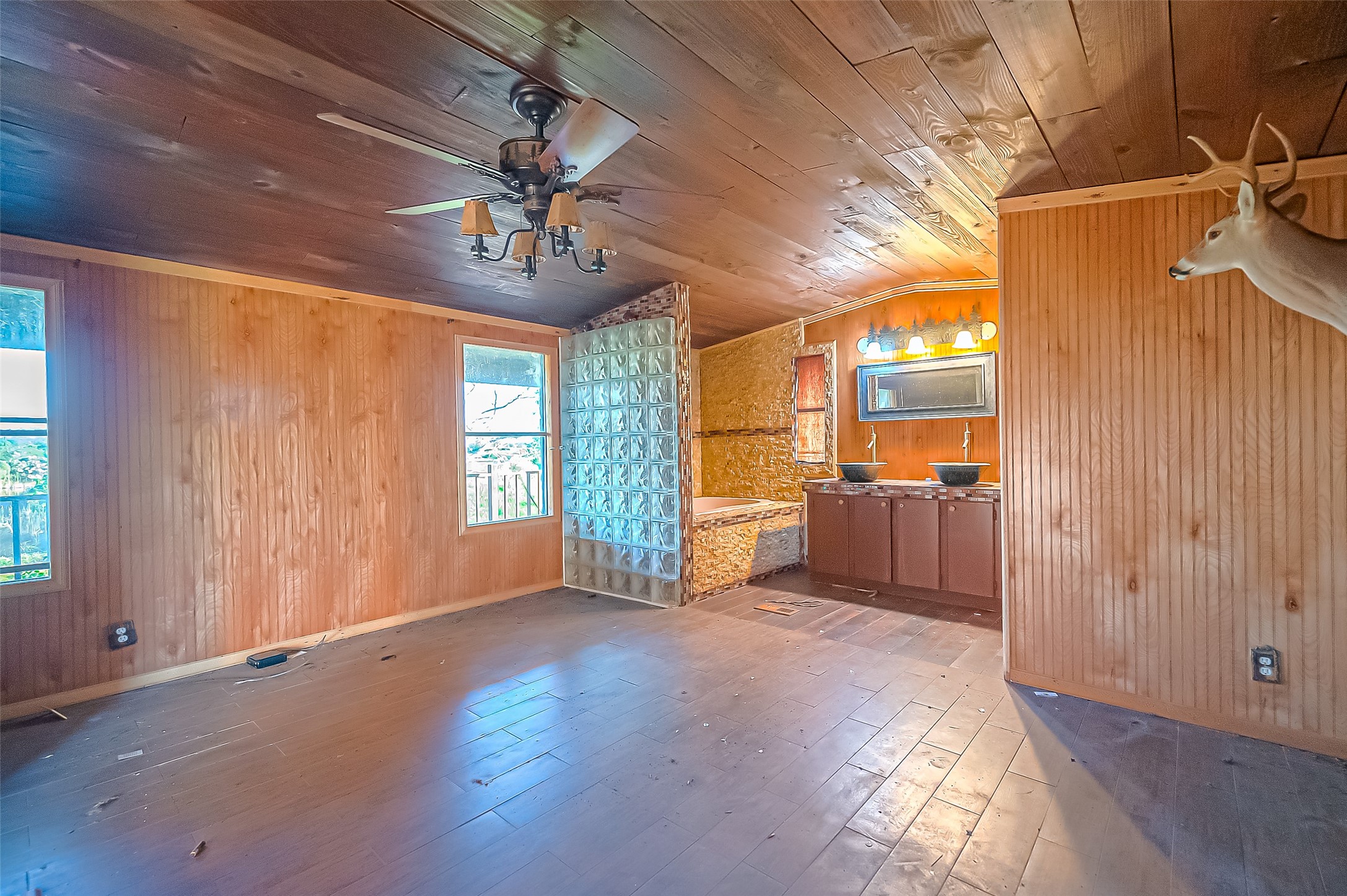 2830 County Road 290 Angleton, TX 77515 - Photo 7 of 11 a view of a kitchen with a sink and a window