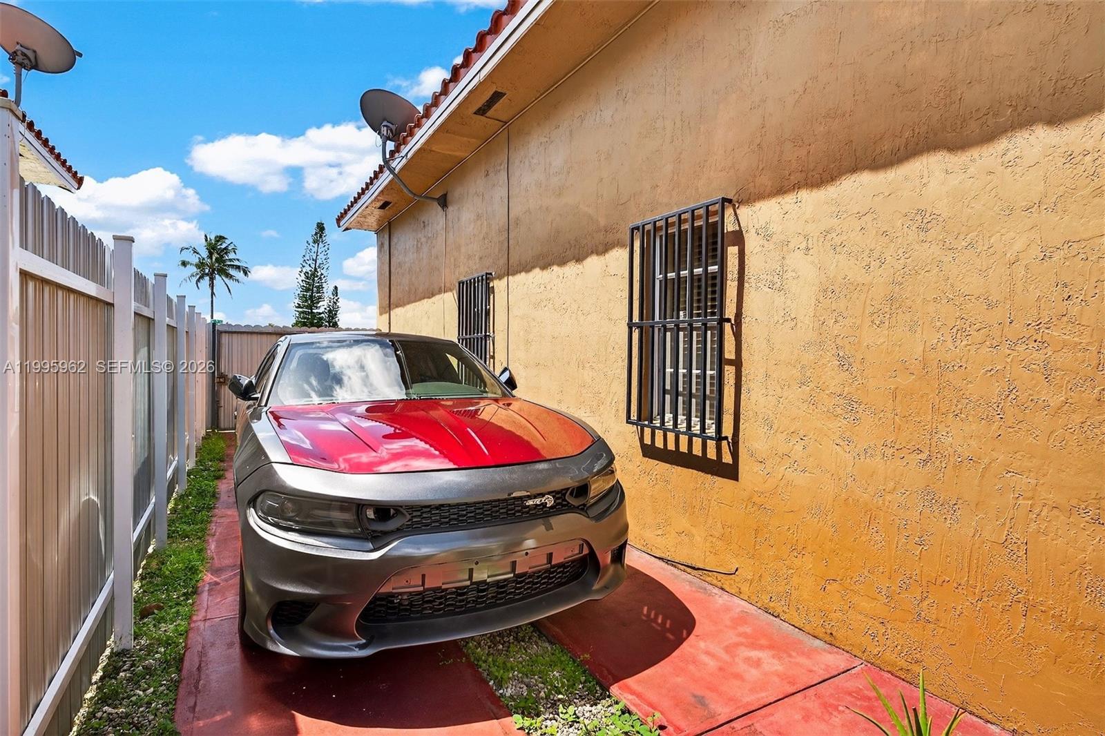 7821 Southwest 9th Terrace Miami, FL 33144 - Photo 26 of 29 Parking on the side of the home